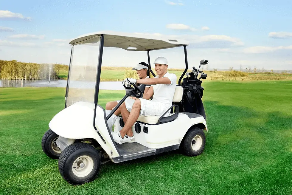 Two person sitting on a golf cart